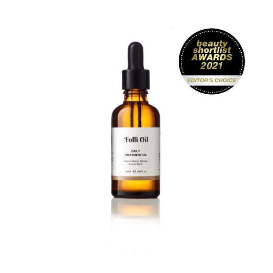 Bottle of Daily Treatment Oil on a white background – simple, natural skincare for calm, smooth skin with Beauty Shortlist Awards Editor's Choice certificate
