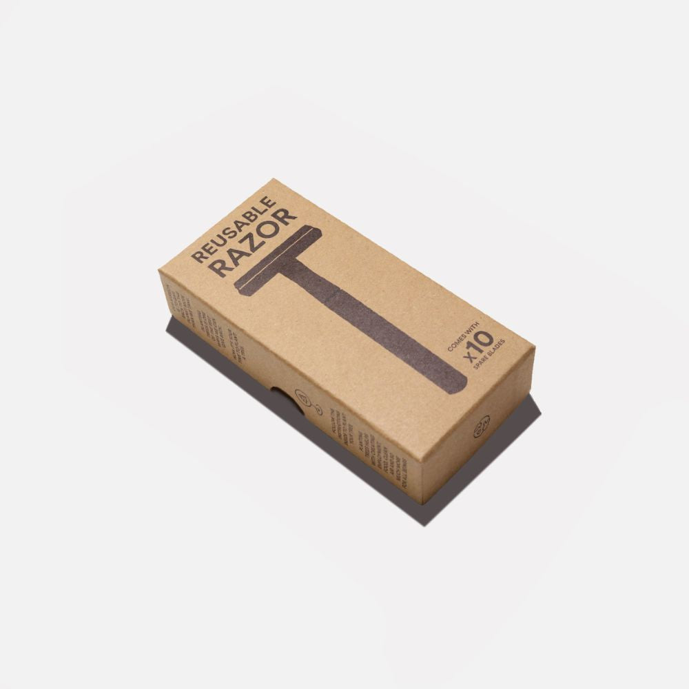 Safety razor presented in natural kraft box – sustainable, plastic-free grooming solution.